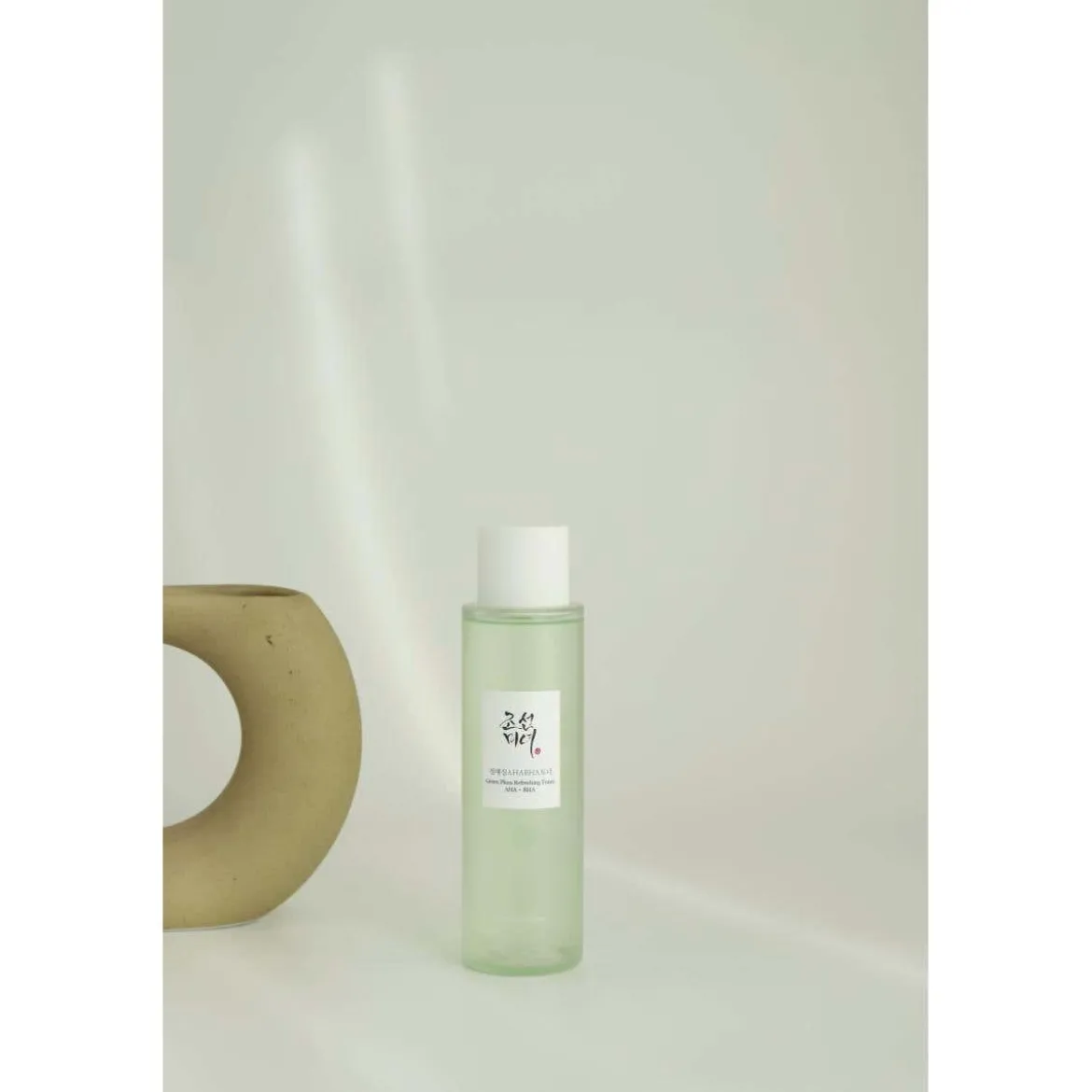 Green plum refreshing toner: aha + bha